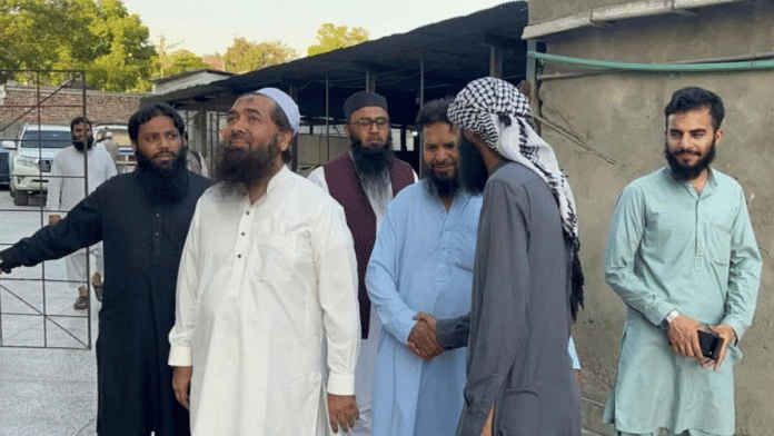 LeT terrorist leader Hafiz Abdul Rauf (in white) inspecting construction of new Lashkar buildings in Rawalpindi, Pakistan