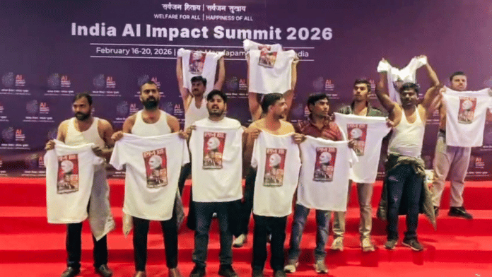 Indian Youth Congress workers stage a protest at Bharat Mandapam during the India AI Impact Summit 2026